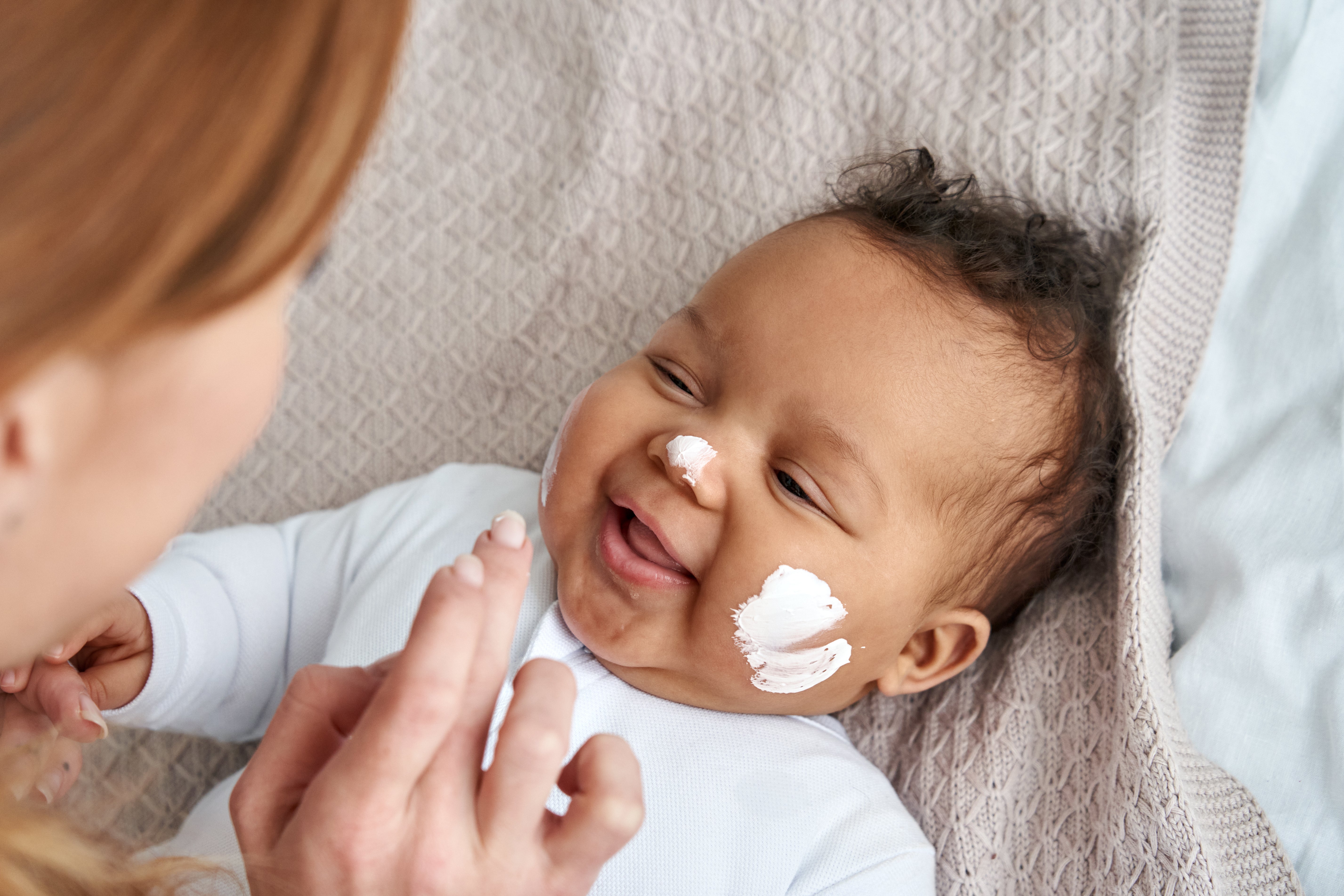 The First Touch: Nurturing Newborn Skin with Nature's Softness